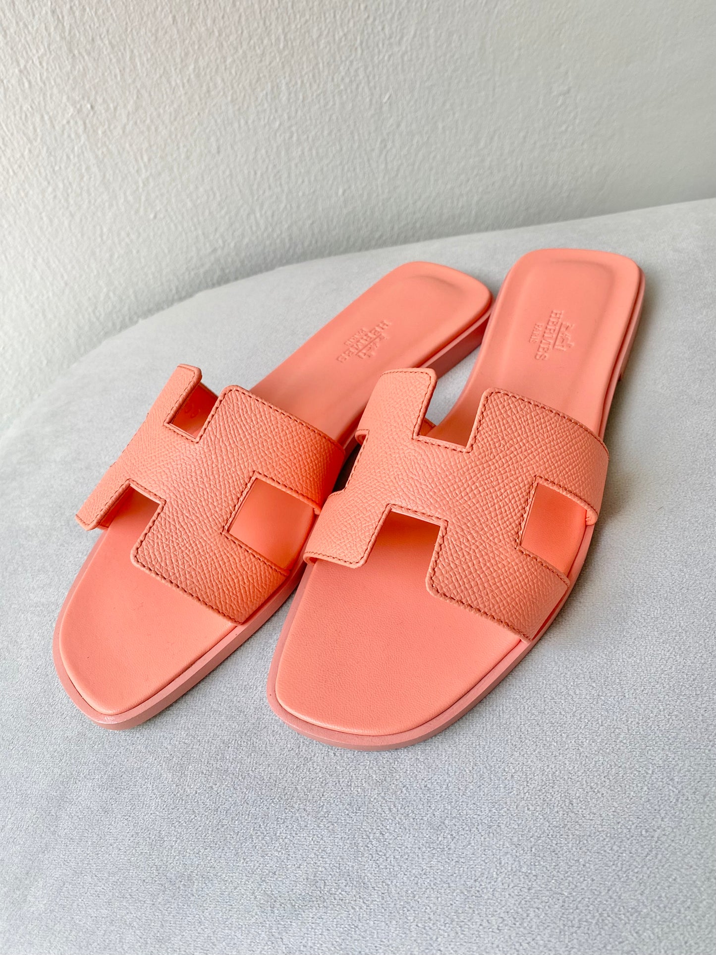 HERMÈS Oran Sandals in Orange Joey