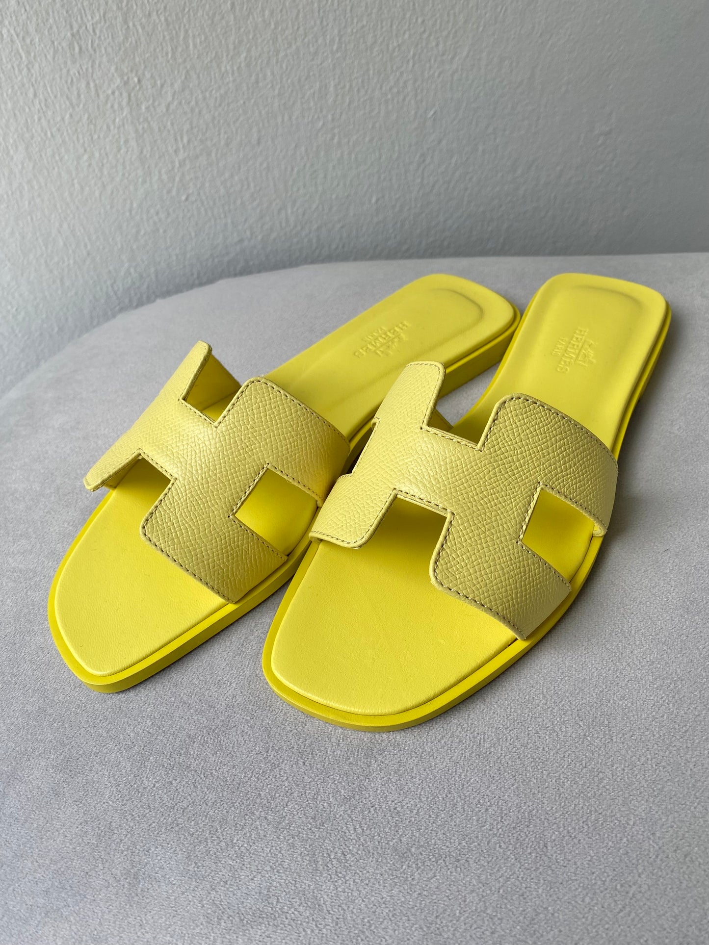 HERMÈS Oran Sandals in Jaune Curcuma