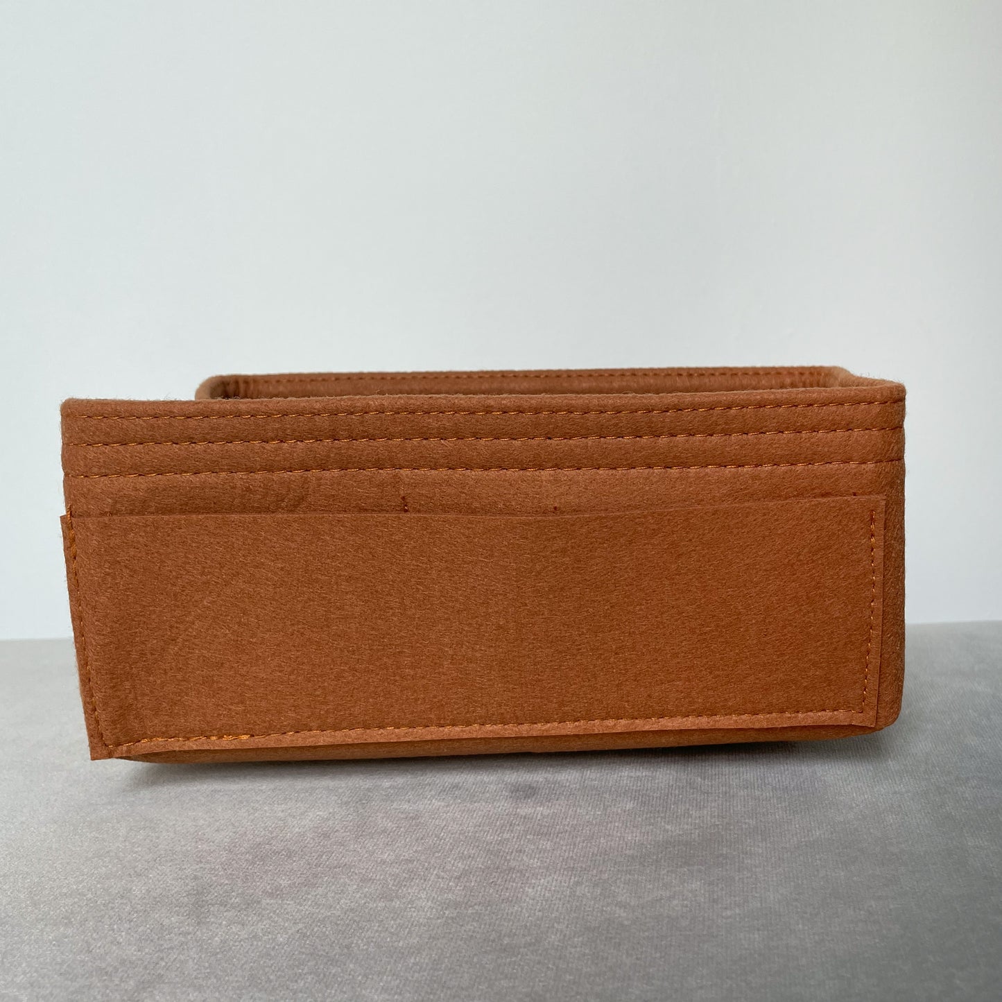 Kelly bag Caddy in gold